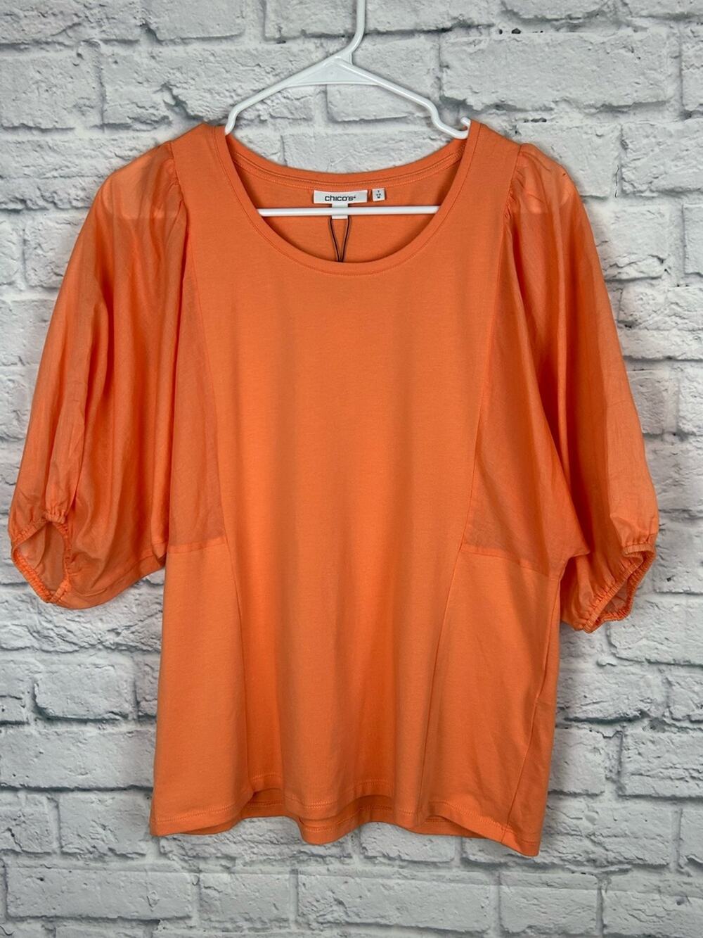 Chico’s Size 1 M Sunset Peach Orange Fabric Mix Dolman Sleeve Top NWT